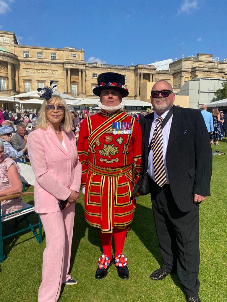 Rita and John with Yeoman of the Guard, Royal Kennel Club garden party, Buckingham Palace, London.