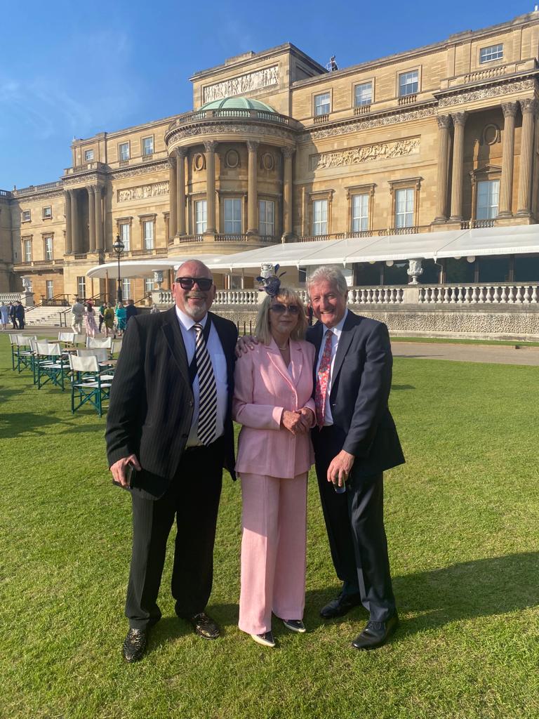Rita and John with Royal Kennel Club chairman Tony Allcock (right), Royal Kennel Club garden party, Buckingham Palace, London.